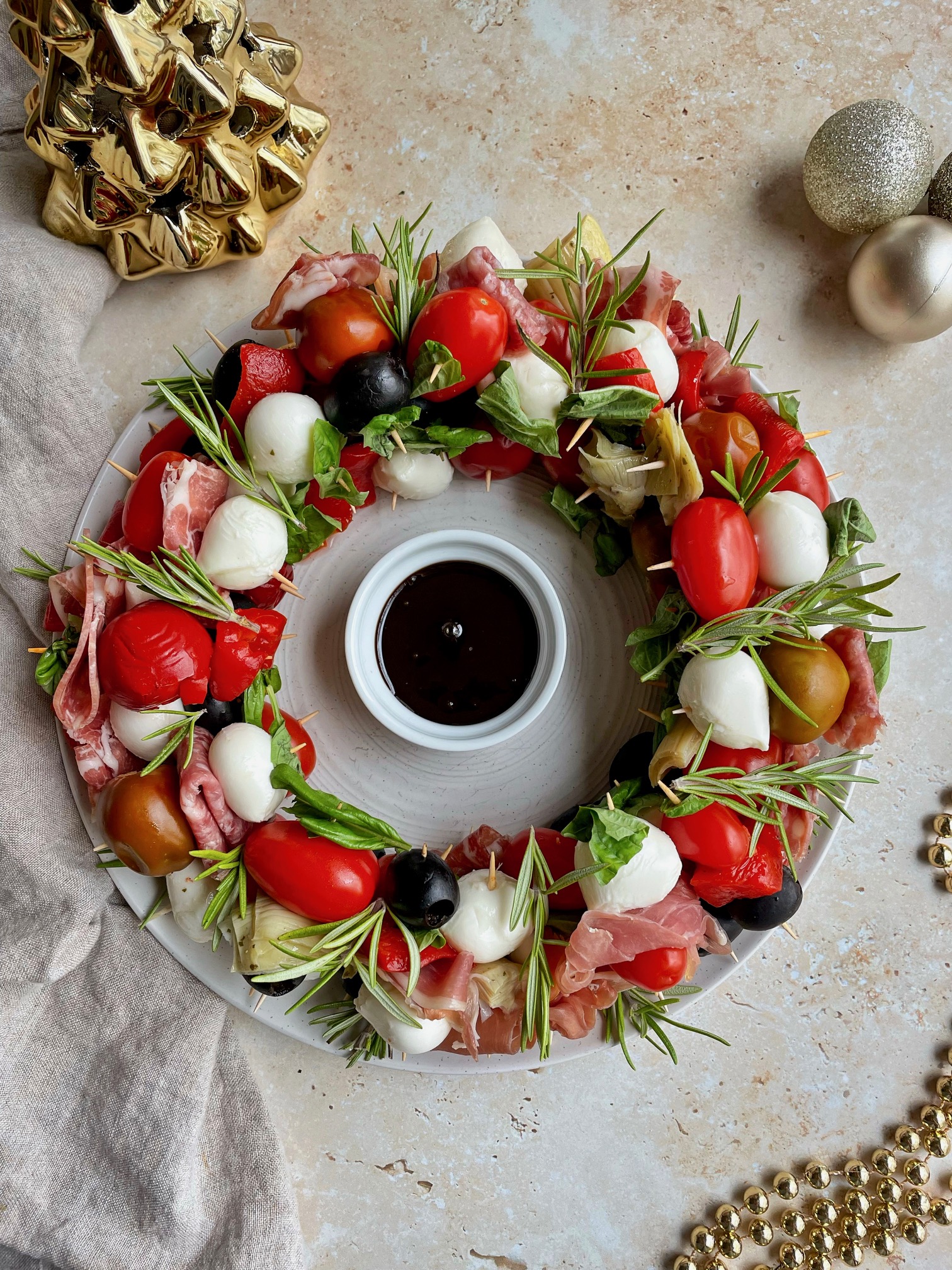 Antipasto wreath with balsamic glaze for dipping.