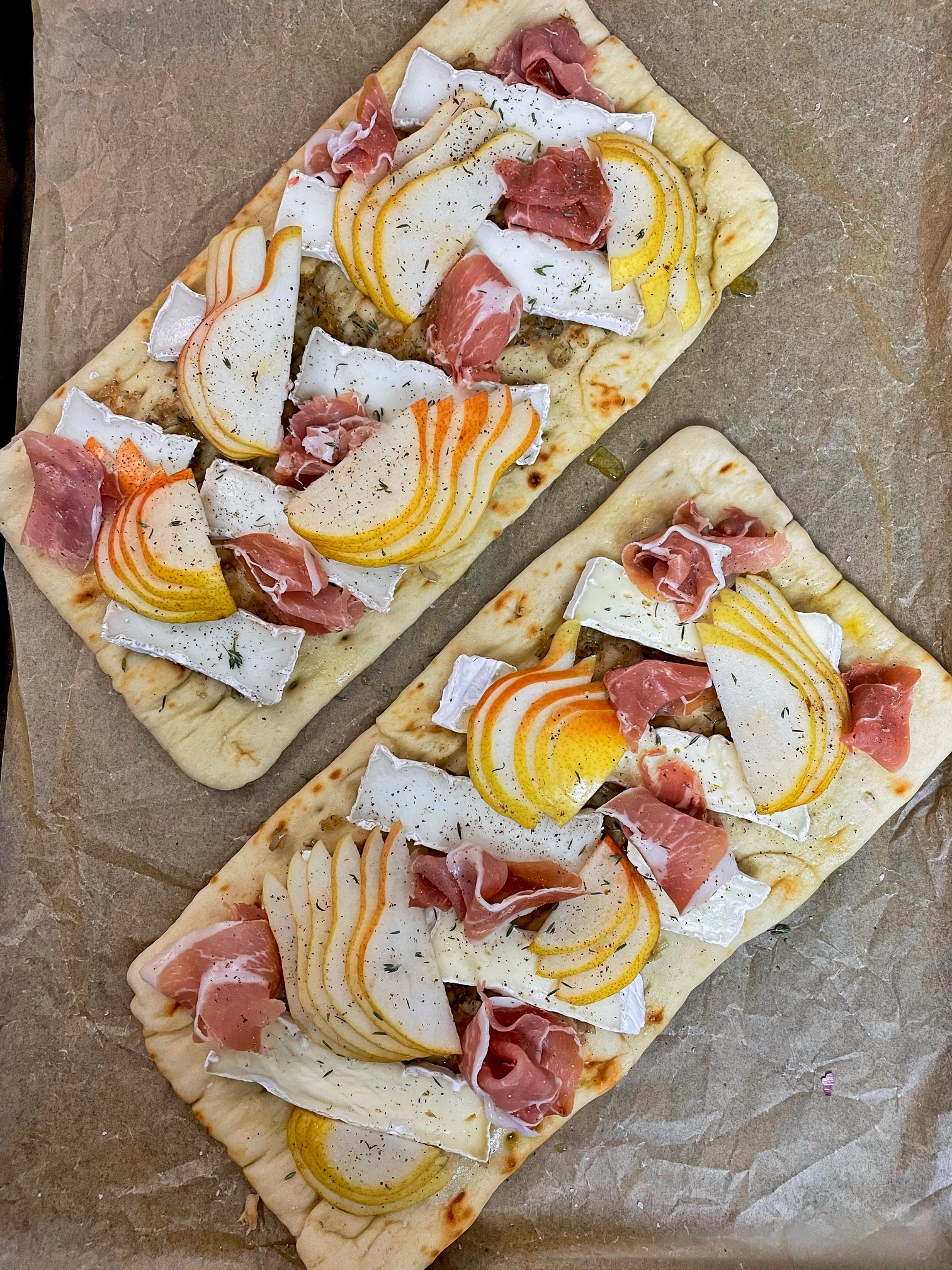 pear and brie flatbread before baking