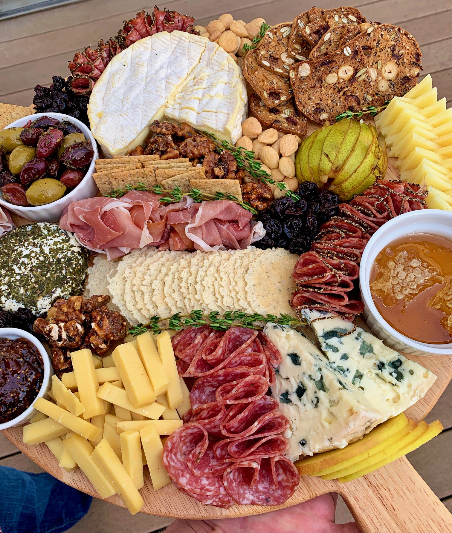 A large round cheeseboard for 20 crowd pleasing thanksgiving appetizers.