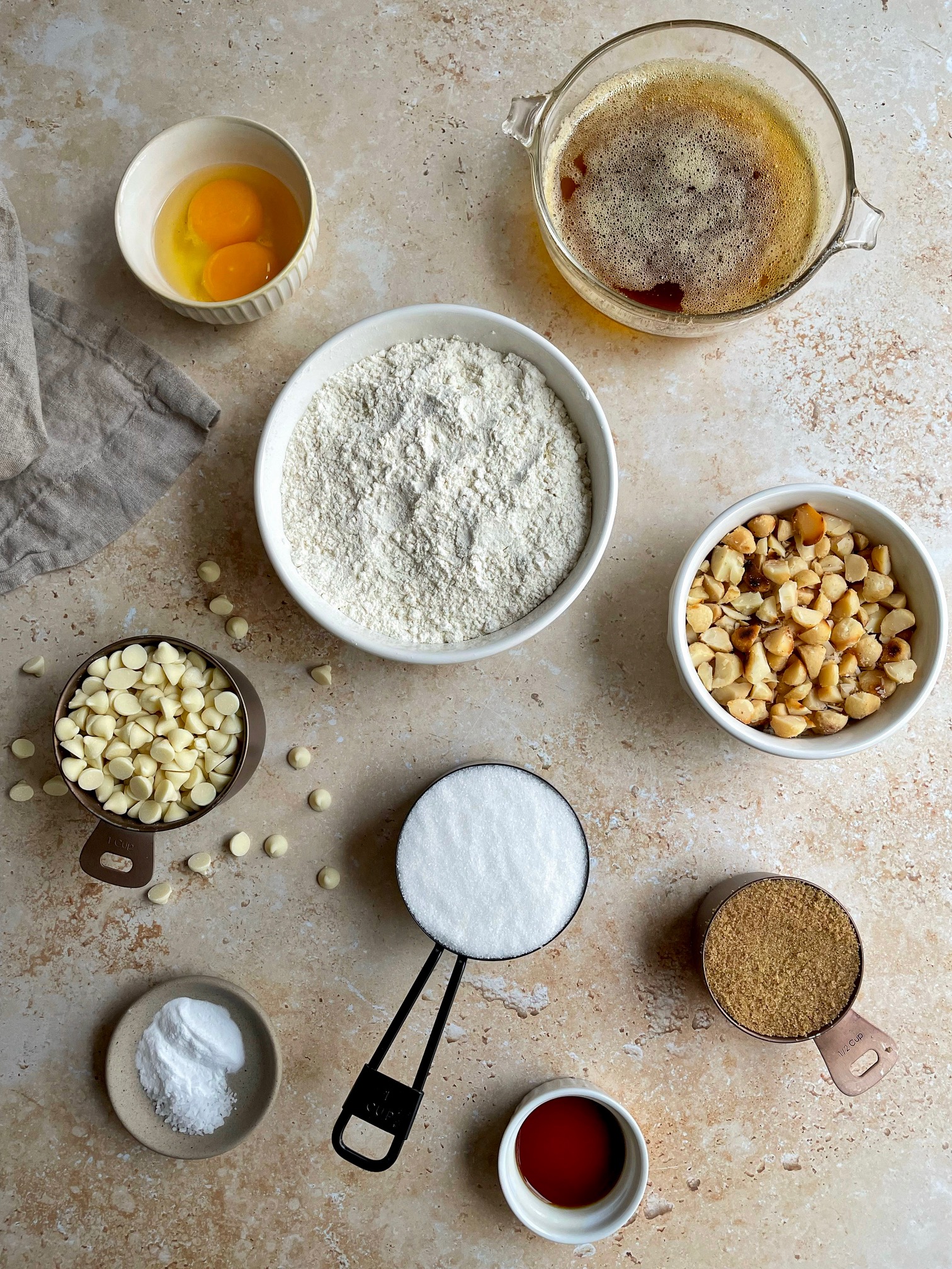 The ingredients for brown butter white chocolate macadamia nut cookies.