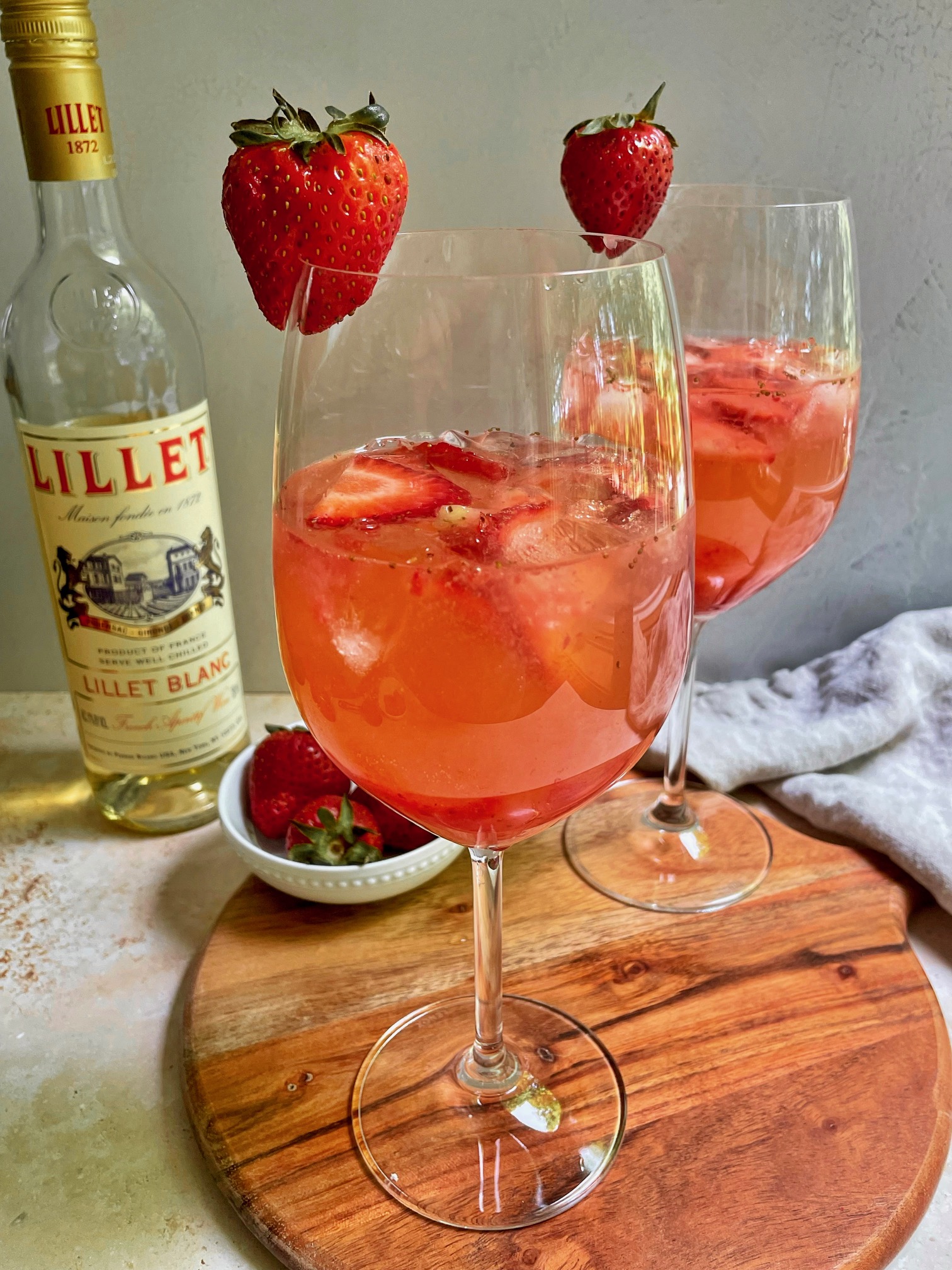 Two strawberry spritz cocktails.