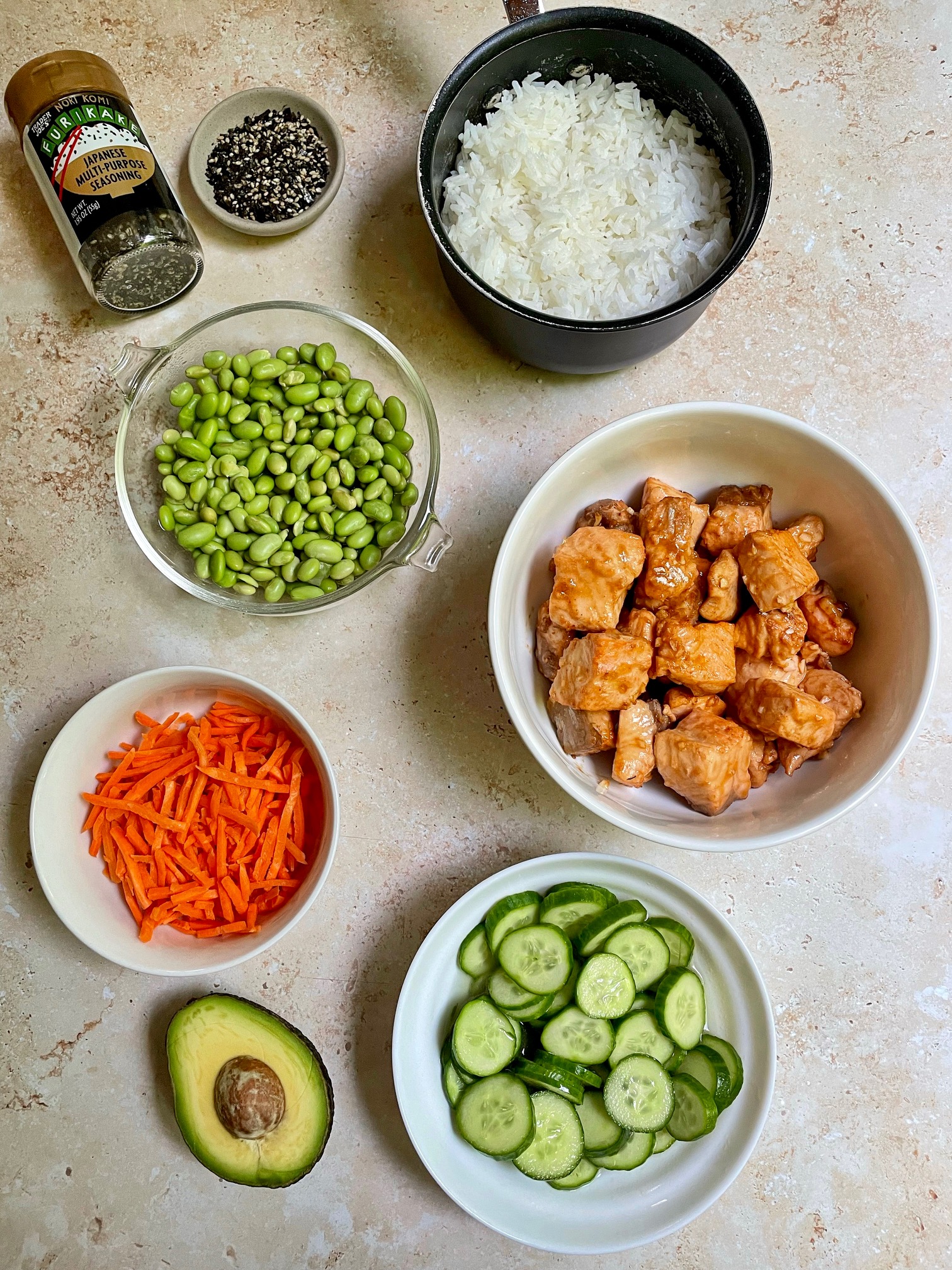 All the ingredients needed to assemble the salmon rice bowls.