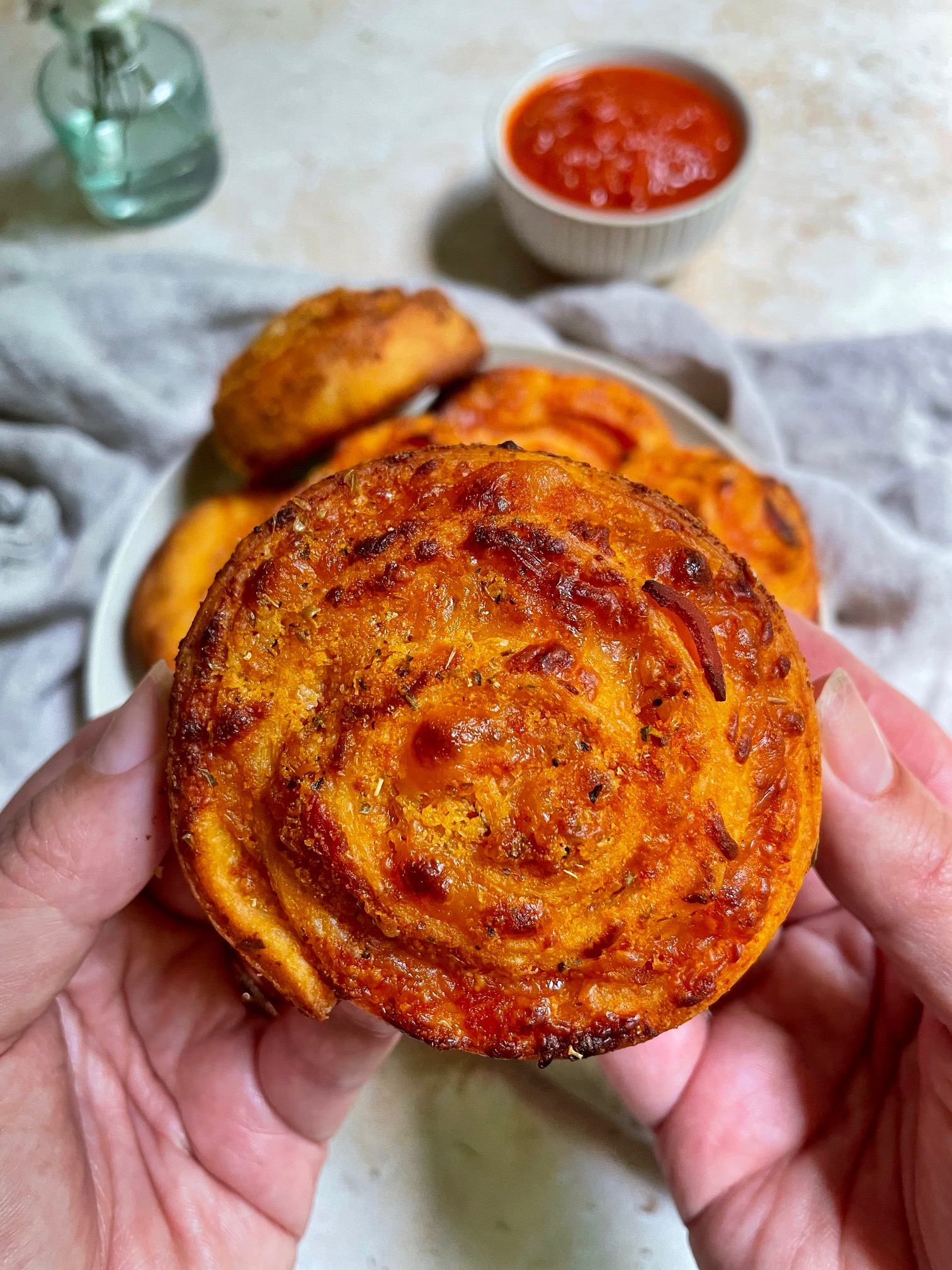 A close up of a homemade pizza roll.