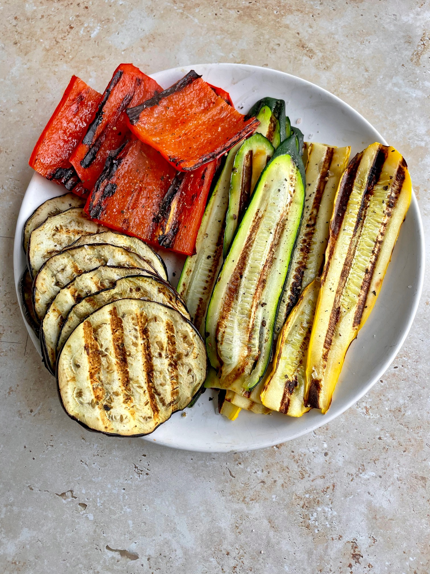 Grilled veggies on a plate.