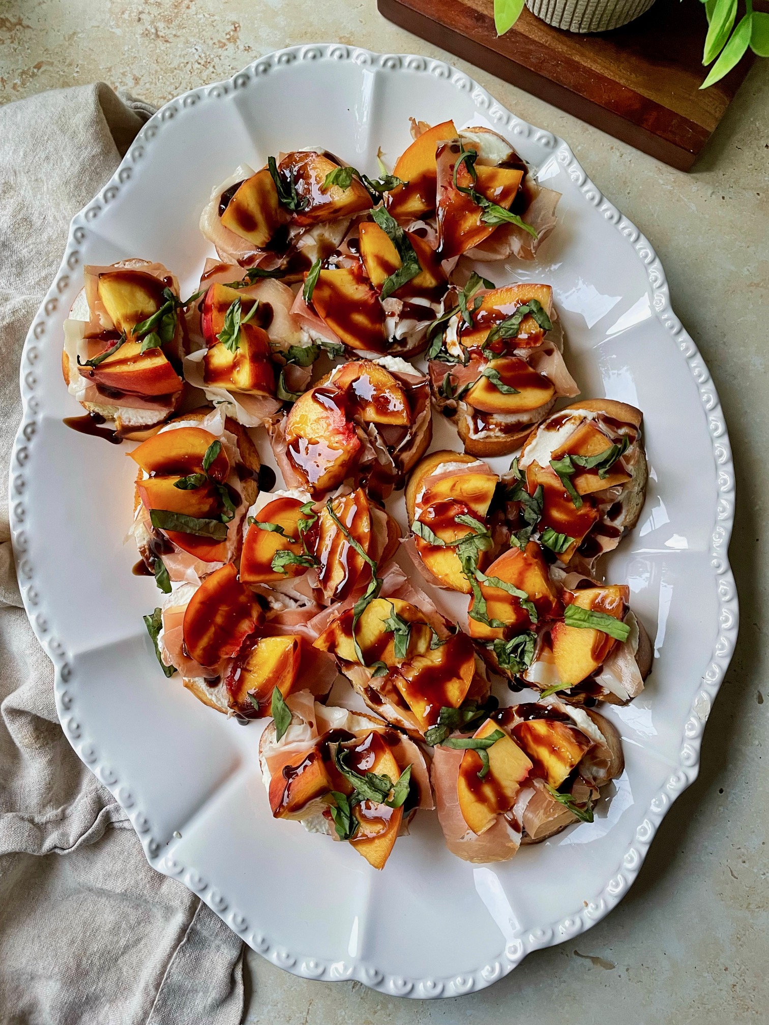 Peach Ricotta and Prosciutto Crostini