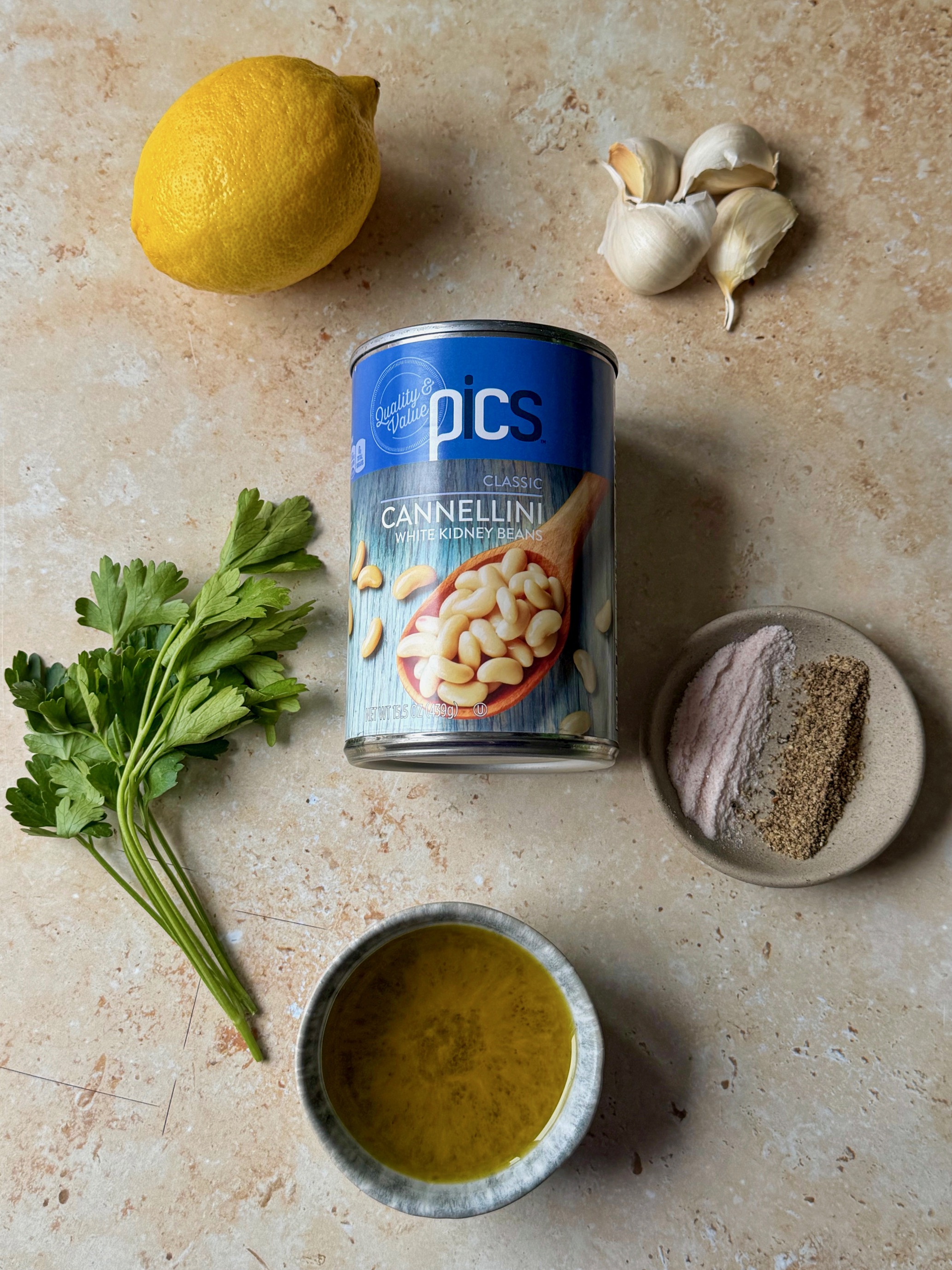 The ingredients needed to make white bean dip.