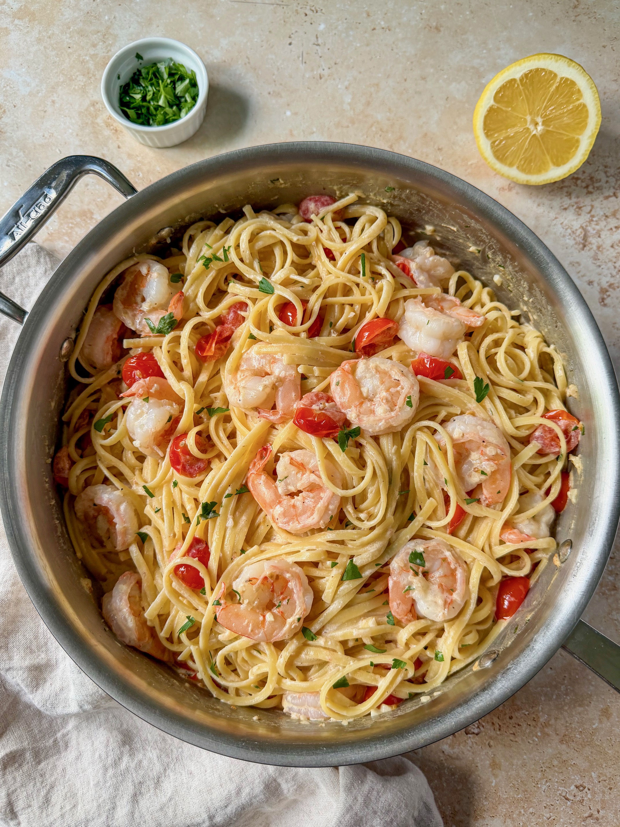 The creamy lemon garlic shrimp pasta in the pan.