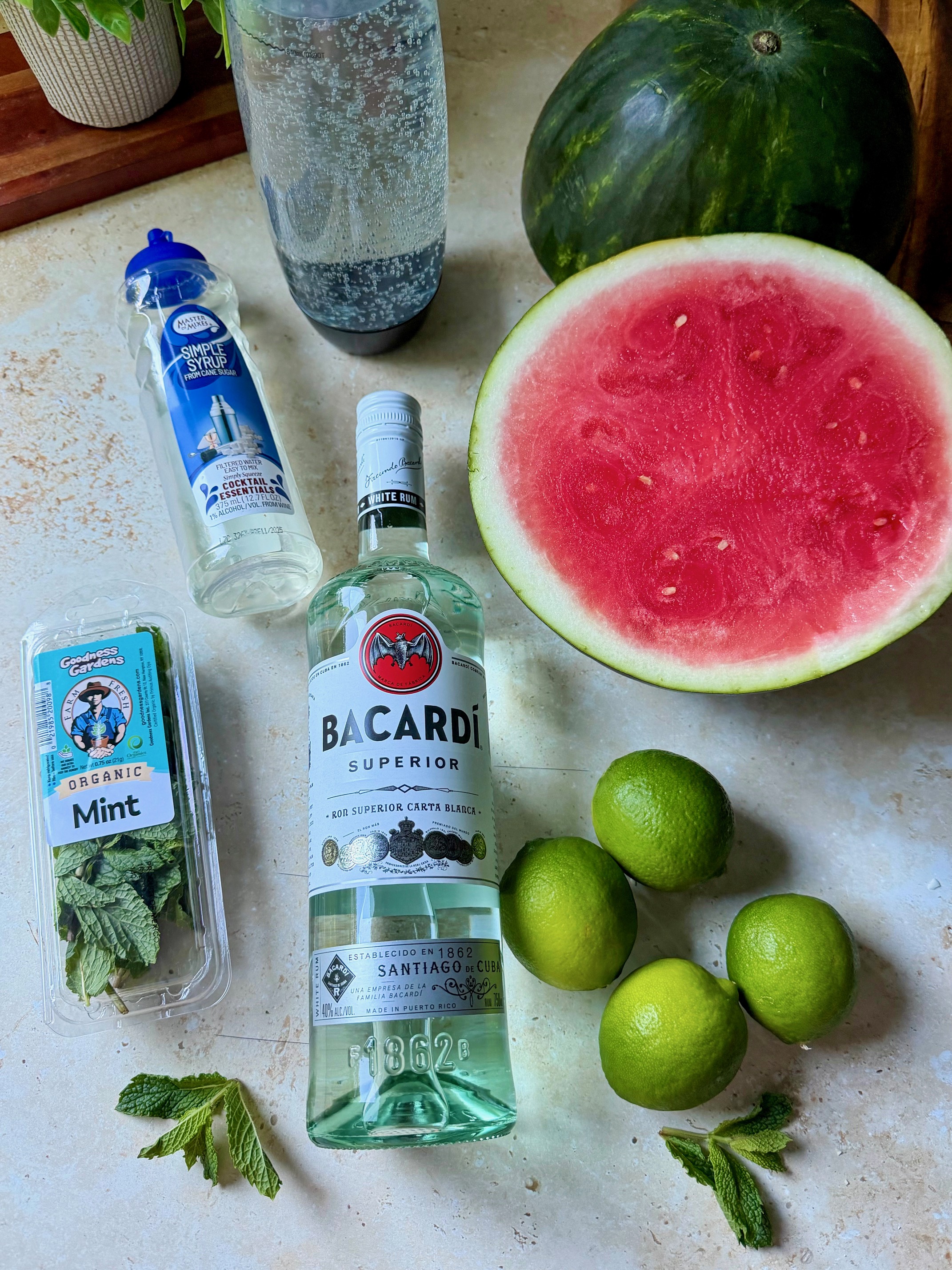 The ingredients to make watermelon mojitos.