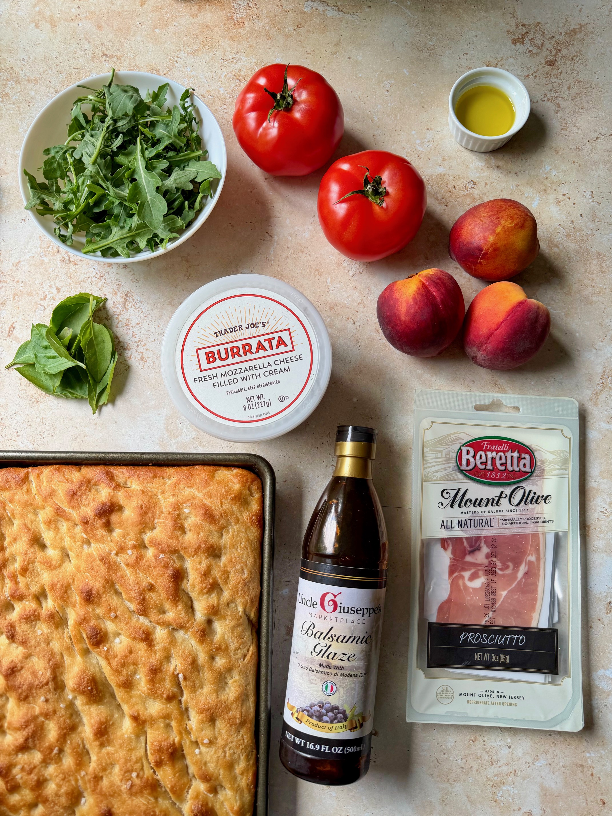 The ingredients to make this peach, prosciutto and burrata sandwich.